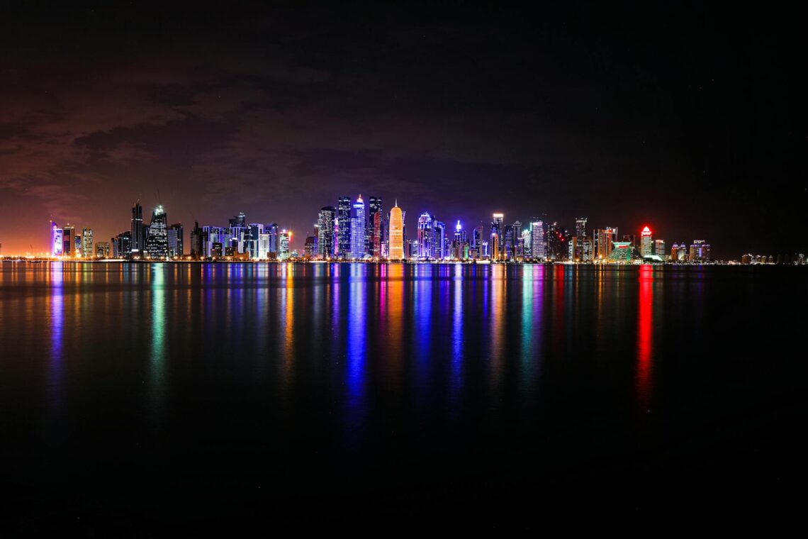 city skyline during night time